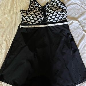 Black Women’s large cup size one piece swimsuit. Cup size fits DDD to F